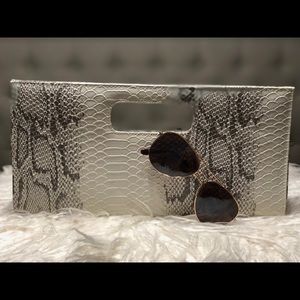 White snakeskin bag